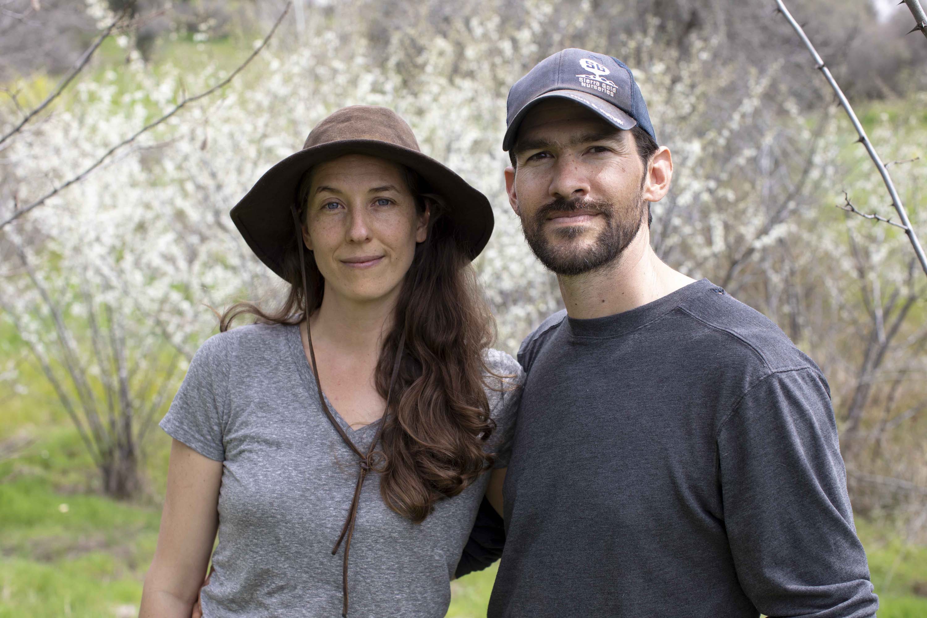 Alan Haight (pictured in red shirt) founded Riverhill Farm just outside Nevada City in 2001. In 2018, he and and his wife and farming partner, Jo McProud, handed farm operations to a younger farmer, Antonio Garza (pictured in dark gray shirt), in a lease agreement that allows Haight and McProud to retire and continue living on the farm. Garza’s partner, Daylin Wade (pictured in light gray shirt), works part time on the farm.